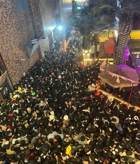 South Korea grieving after more than 150 die in Halloween crowd surge ...