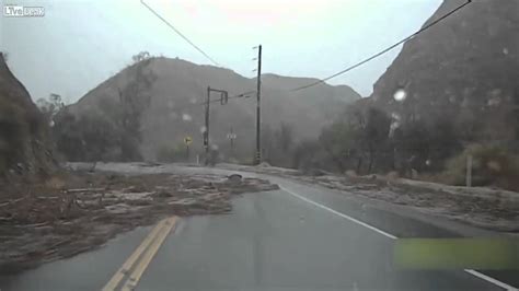 Dashcam captures flash flood in California as driver flees in reverse ...