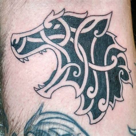 55 Coolest Norse Wolf Tattoo Ideas