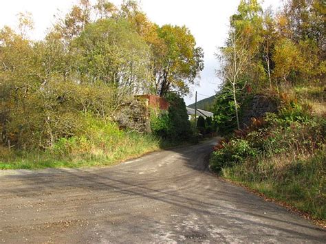 Railway bridge buttress © Richard Webb cc-by-sa/2.0 :: Geograph Britain and Ireland