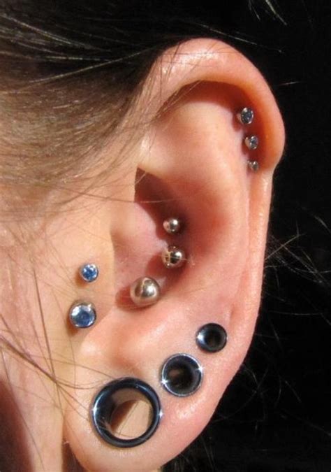 dang. for as much as there is in her ear, it's really tasteful looking. | Cool piercings ...