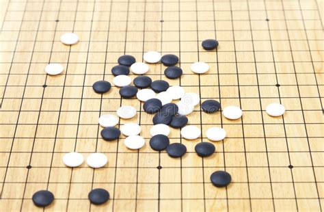 Go game board stock photo. Image of determination, strategy - 100780622