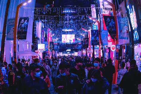 Crowd of People on a Busy Street at Night · Free Stock Photo