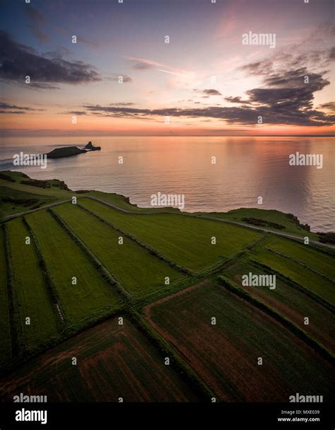 Aerial view of sunset at Rhossili Bay - Rhossili Bay has been voted ...