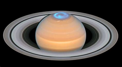 What makes Saturn's atmosphere so hot