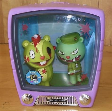 an old tv with two cartoon characters on it's display stand next to each other