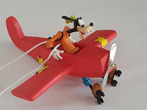 Disney, Walt - Figure - Goofy in plane - Catawiki