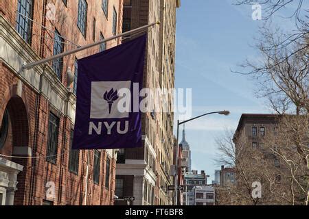 New York University buildings with the purple NYU logo flag hanging ...