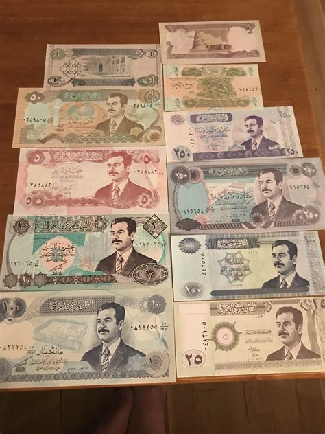 A set of uncirculated Iraqi currency with Saddam Hussein’s likeness : r ...