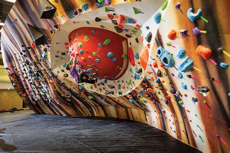 Once a dank cave where diehards trained, the climbing gym is now an architectural wonder, a ...