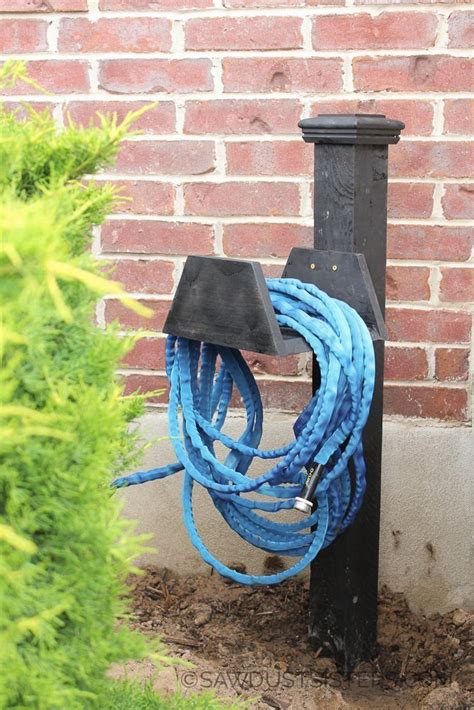 15 Amazing DIY Garden Hose Reel Plans | TreillageOnline.com