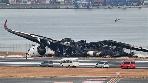 Japan investigators probe conflicting reports on plane crash