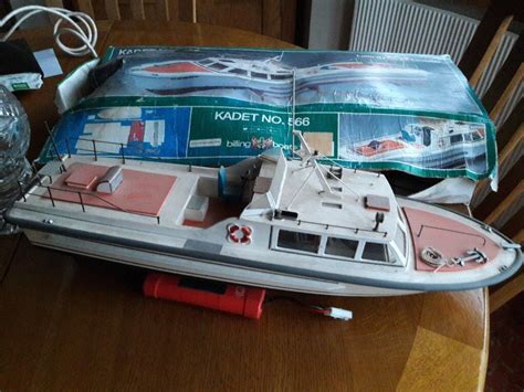 Unfinished radio-controlled boat. Billing Boats Kadet No. 566. Includes all radio control gear ...