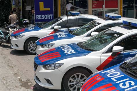 Bali, Indonesia - Oktober 03, 2013: Several Police Cars are Parked Near ...