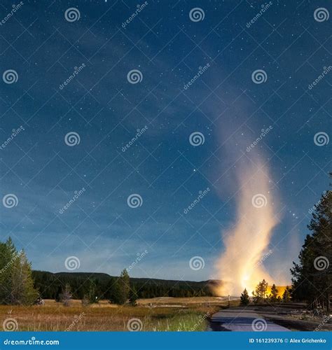 Eruption of Old Faithful Geyser at Yellowstone National Park at Night Stock Photo - Image of ...