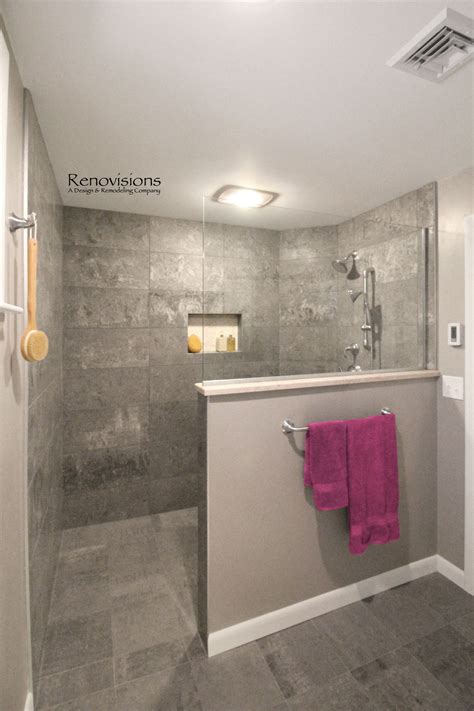 A completed master bathroom remodel by Renovisions. Walk-in shower ...