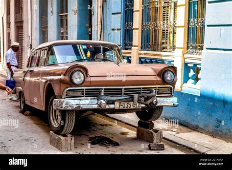 Ancient American car up on blocks in a street in old Havana, Cuba Stock ...