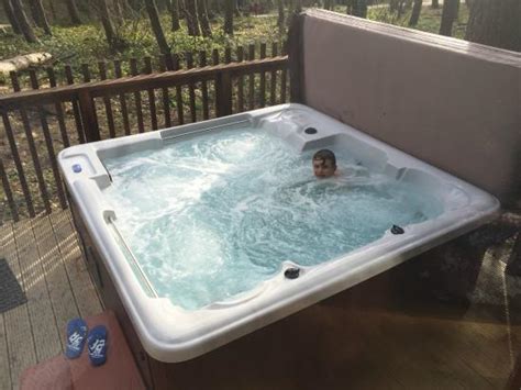 Youngest enjoying the hot tub (Golden Oak) - Picture of Forest Holidays Sherwood Forest ...