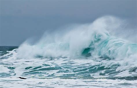 Powerful spindrift waves at cannon beach Oregon during a winter storm ...