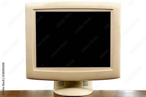 Old CRT computer monitor on 90s office table, blank TV screen display ...