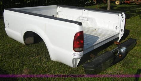 2000 Ford Super Duty pickup truck bed with bumper in St Marys, KS | Item A3047 sold | Purple Wave