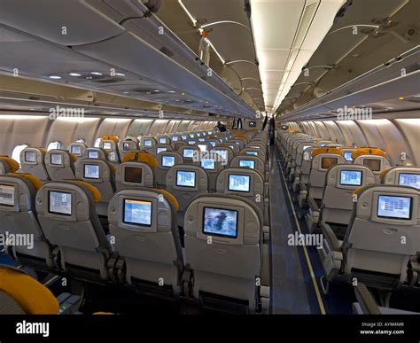 interior view in an aeroplane cabin seats economy class inseat video ...