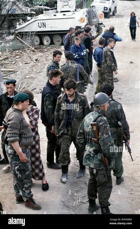 25th April 1993 During the war in Bosnia: ARBiH (Bosnian Muslim) soldiers watch the recovery of ...