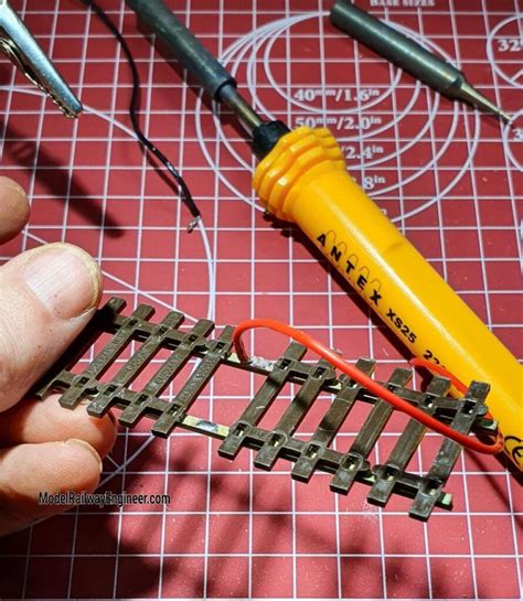 How to attach wires to model train track | Model trains, Model train display, Model railway ...