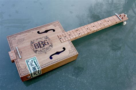 Aroma de C. 3 String Cigar Box Guitar Kit, by ChickenboneJohn Guitars.