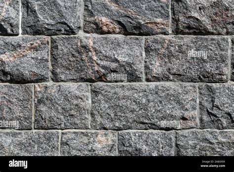 Dark grey brick wall. 3D surface of an exterior wall of a building ...