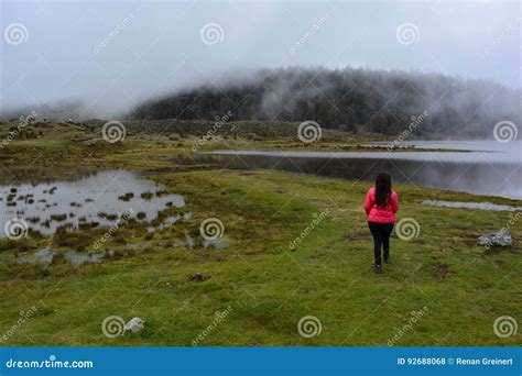 Woman at the Laguna De Mucubaji Lake in Merida, Venezuela Editorial ...