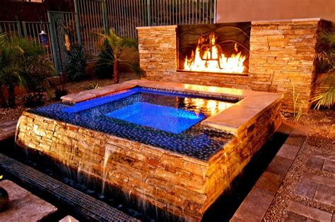 stunning backyard hot tub with water fall | Hot tub backyard, Hot tub outdoor, Backyard spa