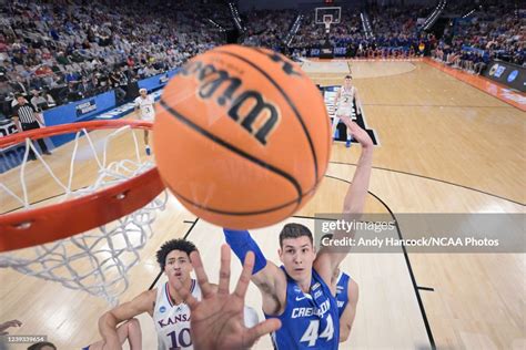 Ryan Hawkins of the Creighton Bluejays anticipates a rebound against ...