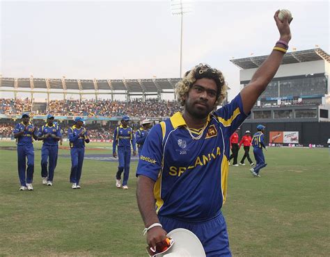 Lasith Malinga salutes the crowd after finishing with six wickets ...