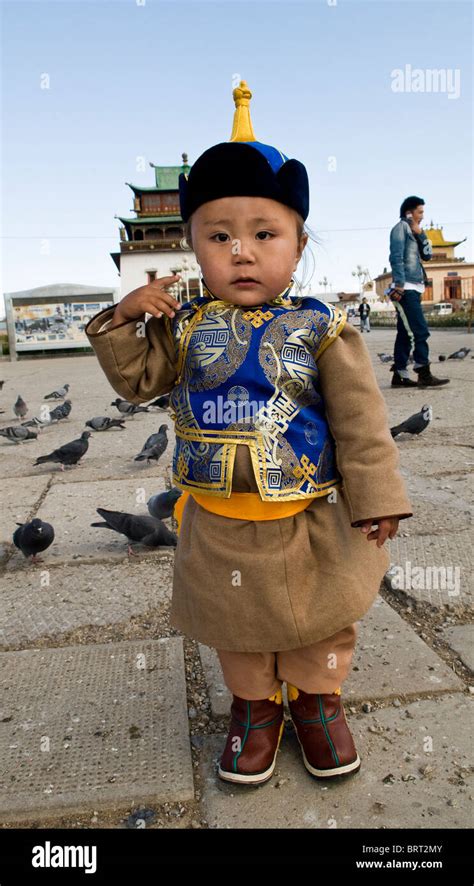 A cute Mongolian boy dressed in a traditional clothing Stock Photo - Alamy