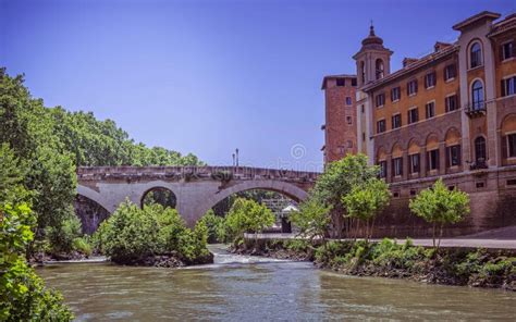 A Scenic View of Tiber Island, Bridge Fabricio and Caetani Fortress ...