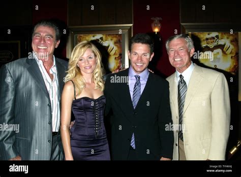 (left to right): Vince Papale, Elizabeth Banks, Mark Wahlberg and Dick Vermeil arrive for the ...