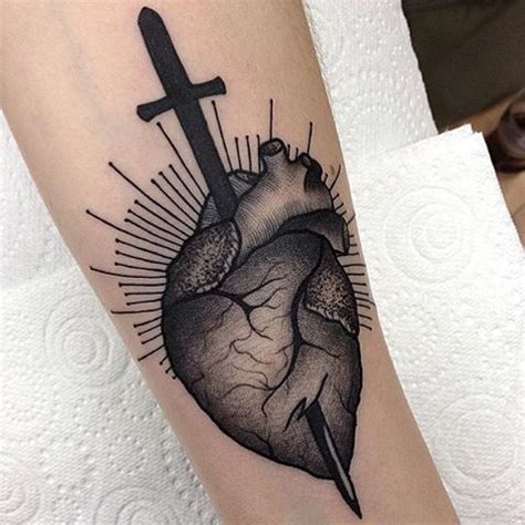 Sword stabbed heart tattoo - Tattoogrid.net