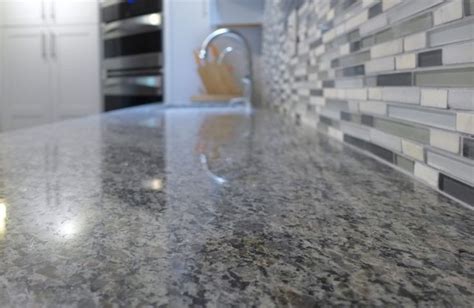 New Caledonia granite countertops - trendy gray shades in the kitchen