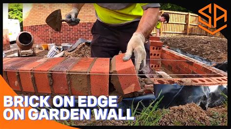 GARDEN WALL BRICK ON EDGE COPING - YouTube