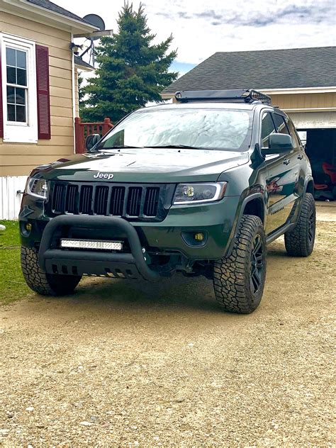 Green Lifted Jeep Cherokee