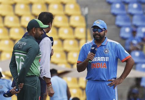 We'll bat first, Rohit Sharma says after winning the toss against Babar ...