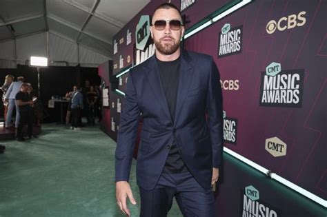 Travis Kelce Suits Up in Navy Blazer & Heeled Boots at CMT Music Awards ...