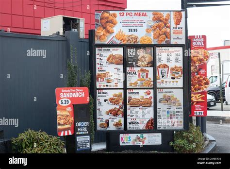 The drive through menu at a KFC, Kentucky Fried Chicken, restaurant on ...