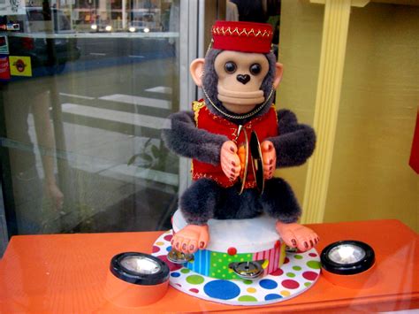 Cymbal-banging monkey toy