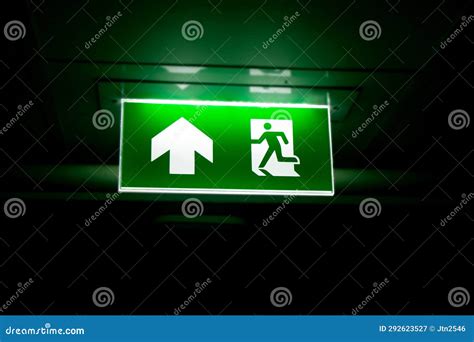 The green emergency exit stock image. Image of management - 292623527