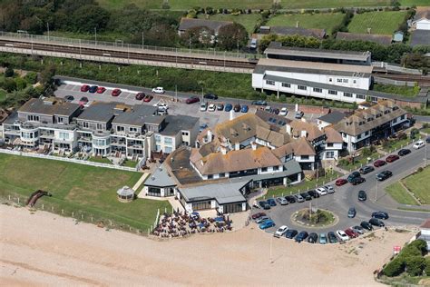 Cooden Beach Hotel & train station aerial image in 2020 | Beach hotels, Aerial images, Aerial