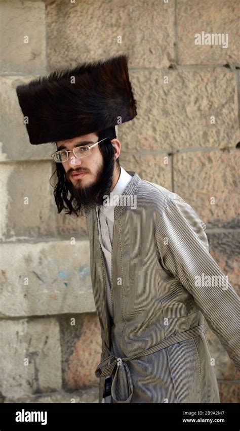 A Hasidic Jewish man wearing a Shtreimel ( traditional Fur hat ) in Mea ...