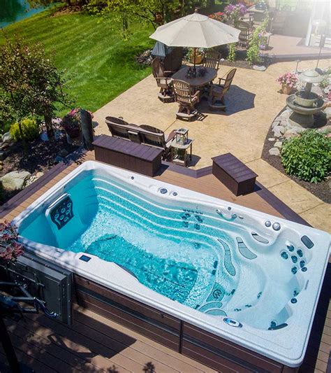 Looking to put a swim spa in your backyard? Check out these inspirational photos! #swimspas # ...