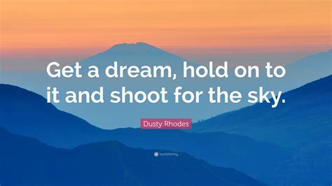 Dusty Rhodes Quote: “Get a dream, hold on to it and shoot for the sky.”